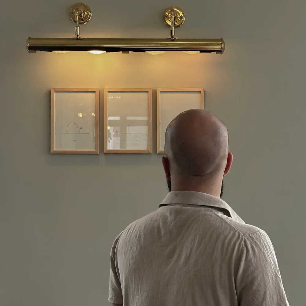 Frederik Smal with his drawings in Reykjavík, 2025. Artist portrait from the solo exhibition Still Life – Still Love.